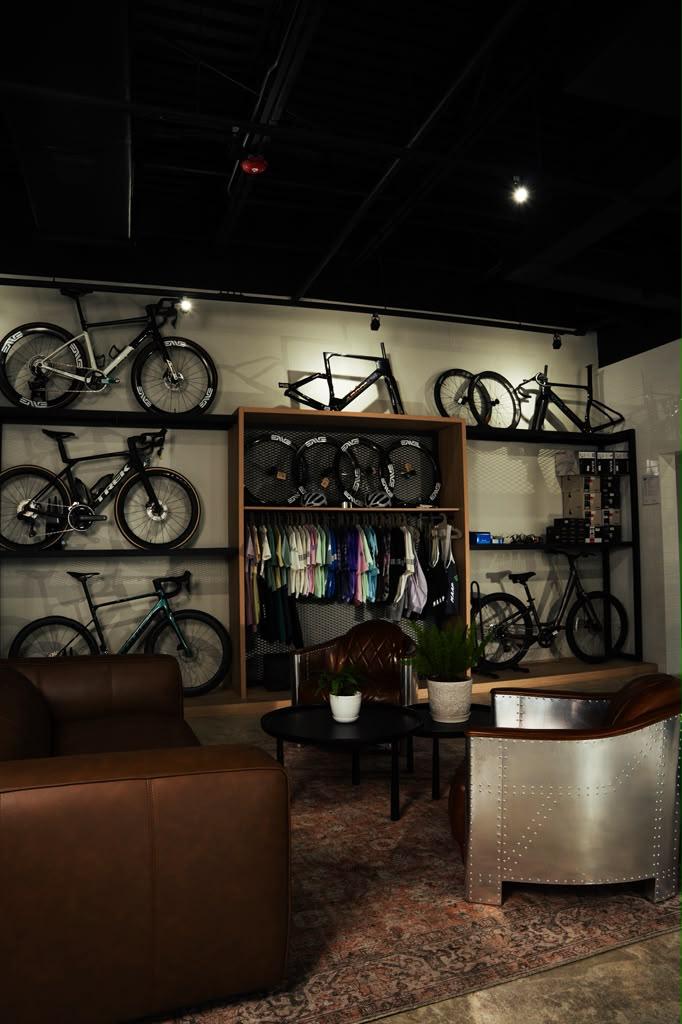 GRIT lounge: road bikes on the wall, ENVE wheels and leather sofas